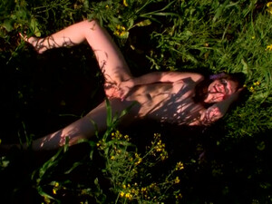 Hungry and awesome redhead babe is masturbating her kitty outdoors