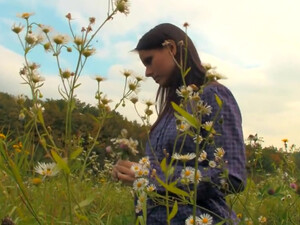 Petite and beautiful teen with nice tits is fingering her kitty outdoors